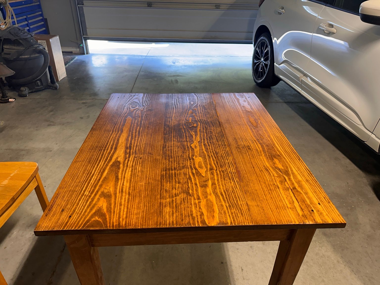 Straight front view of the complete tabletop after the fourth polyurethane coat