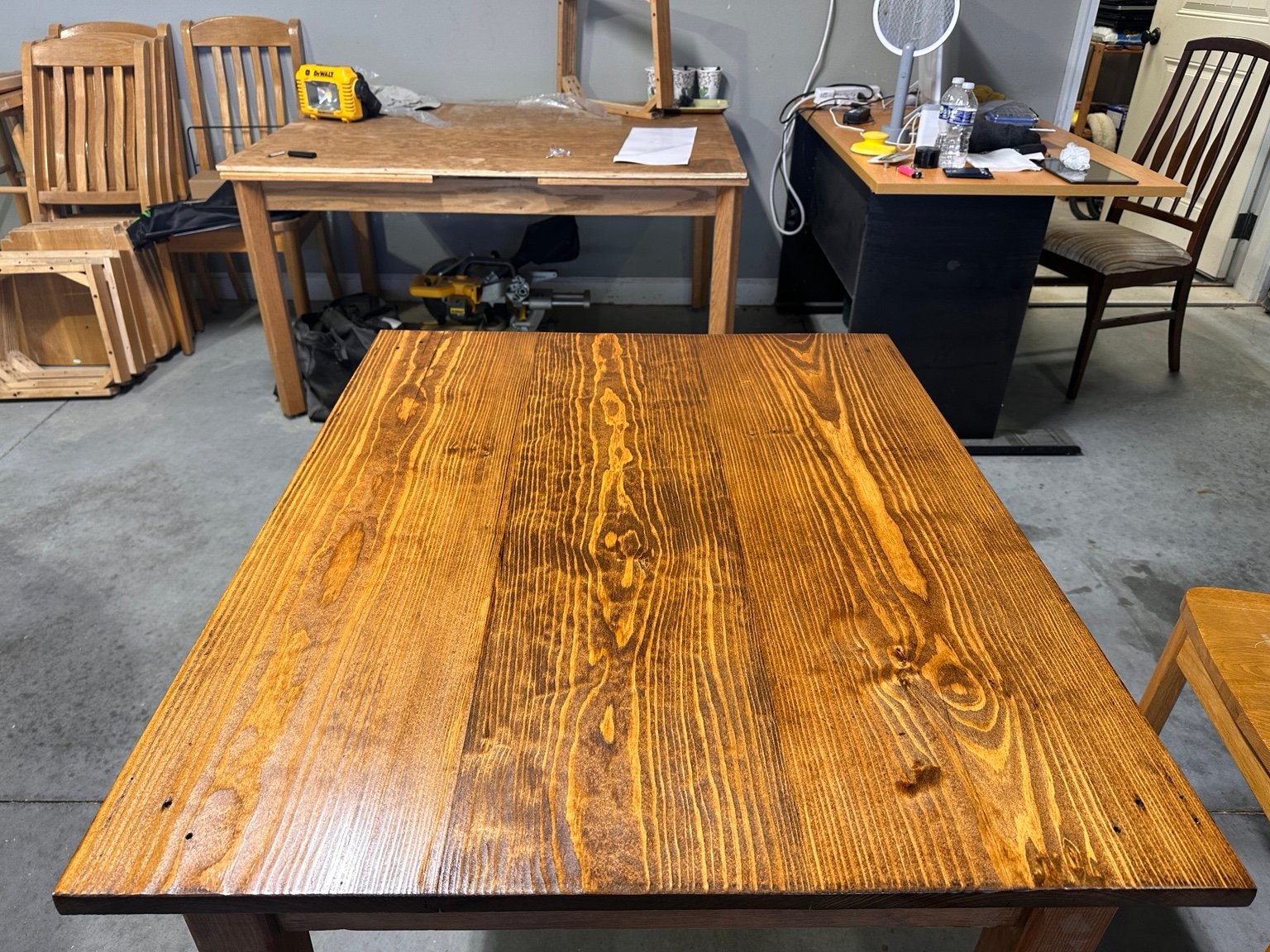 Full workshop view across the table after its fourth polyurethane coat
