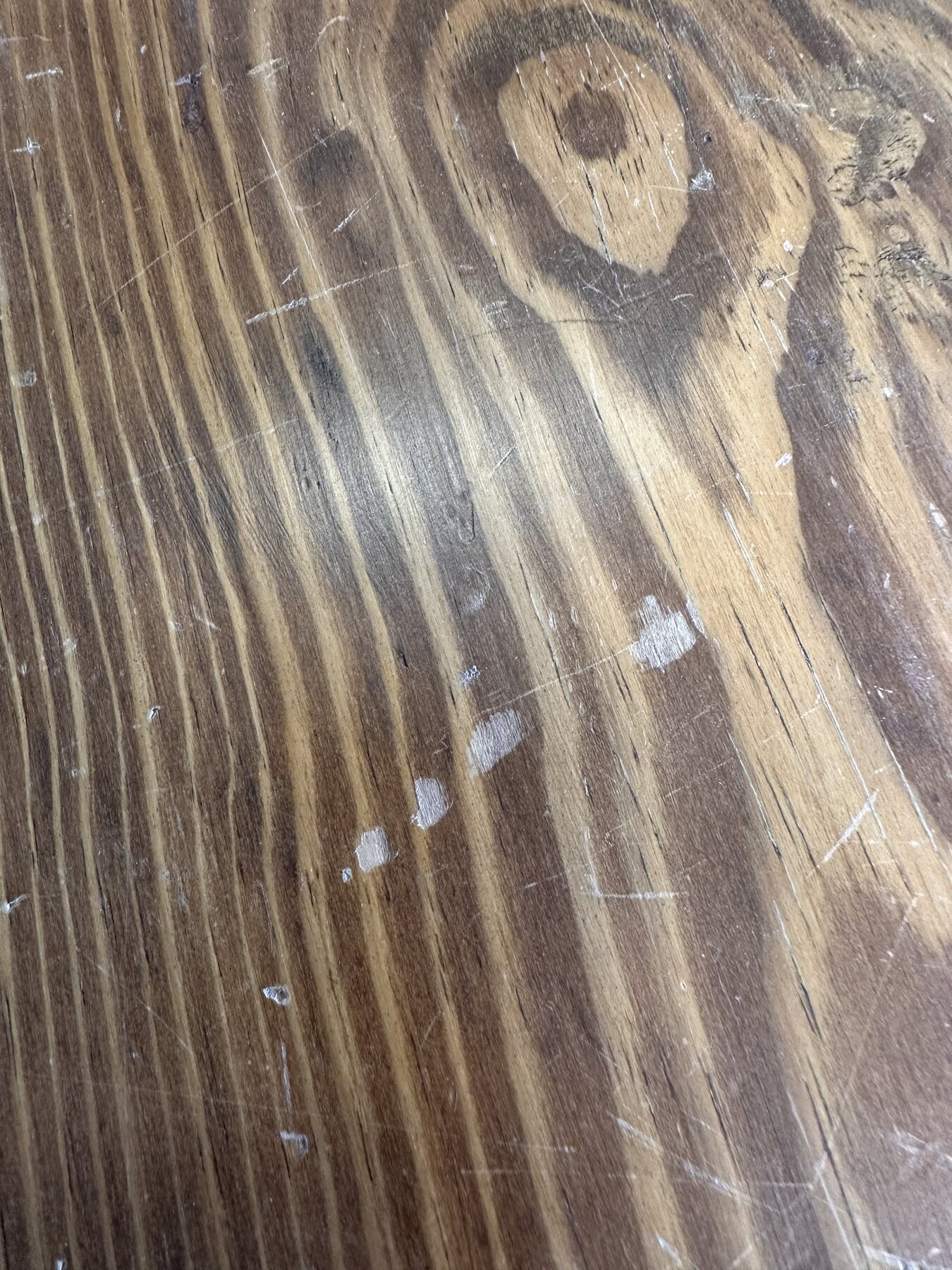 Close view of the pine grain on Bob's drop-leaf table